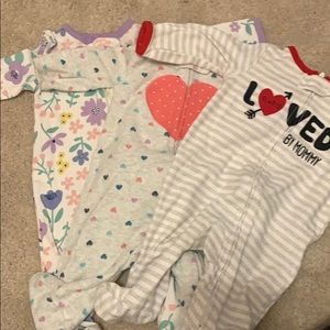 3 Carters Sleep and Play onesies.
